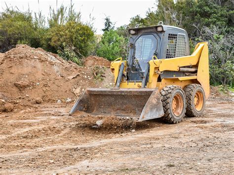 can you make a living with a skid steer|is a skid steer for dredging.